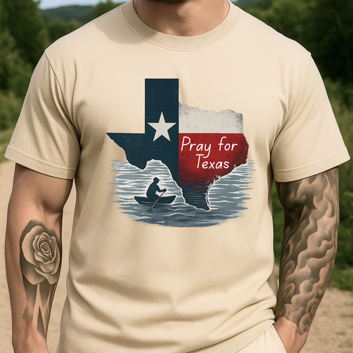 Sand-colored unisex Pray for Texas T-shirt featuring a vintage Texas flag design and canoe graphic. Casual men’s outfit, great for Texas flood relief and state pride.