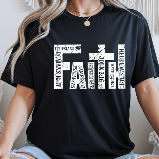 Person wearing a black t-shirt with white FAITH design
