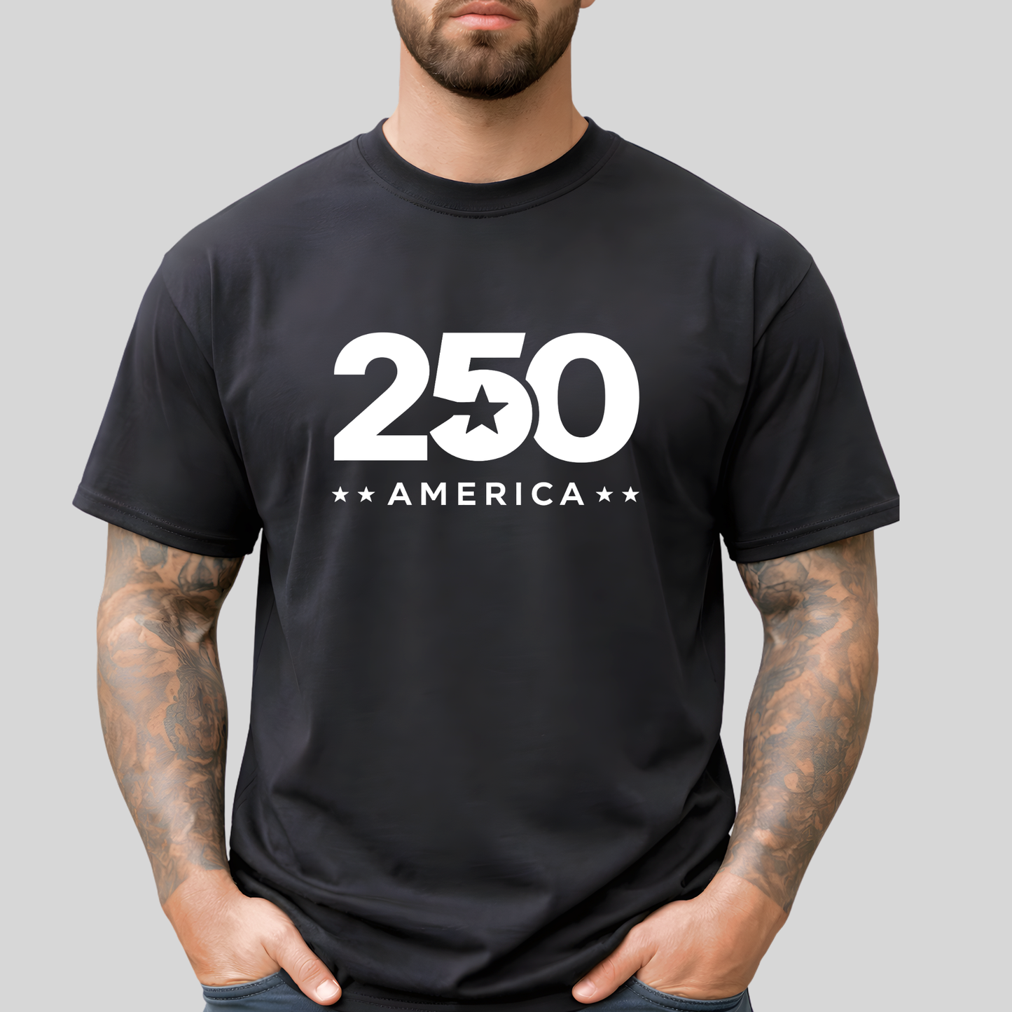 Person wearing a black t-shirt with '250 America' printed on it against a gray background