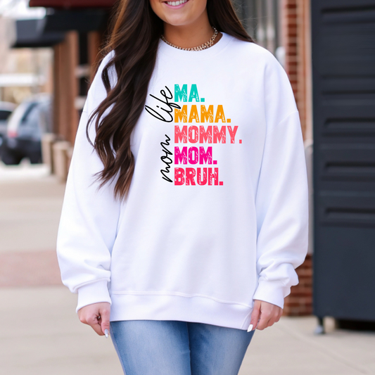 Cozy white sweatshirt with colorful mom life text – casual outfit idea