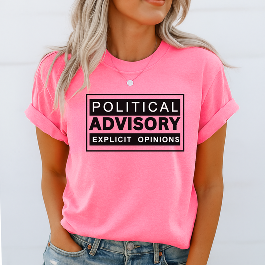 Bright pink shirt with “Political Advisory Explicit Opinions” text, styled for patriotic and outspoken women.