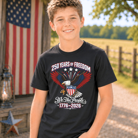Child wearing apatrioic black America 250 t-shirt with a patriotic design in front of an American flag.