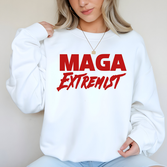 Female model in white sweatshirt featuring MAGA slogan in red