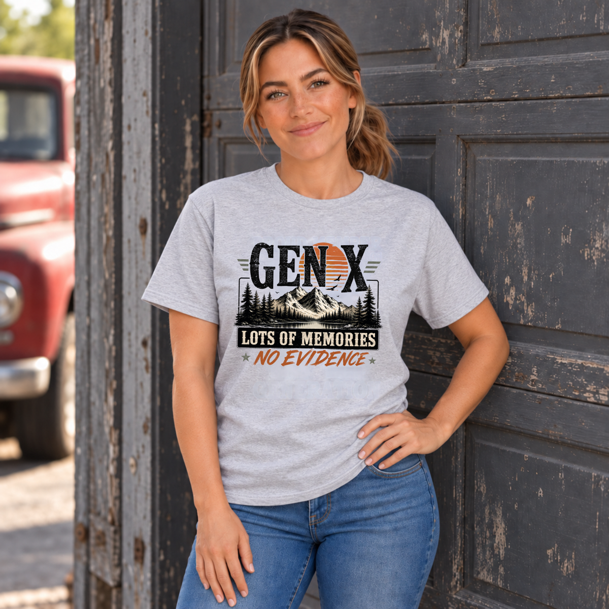 Women's sports gray Gen X T-shirt with Lots of Memories No Evidence mountain graphic, modeled with one hand on her hip