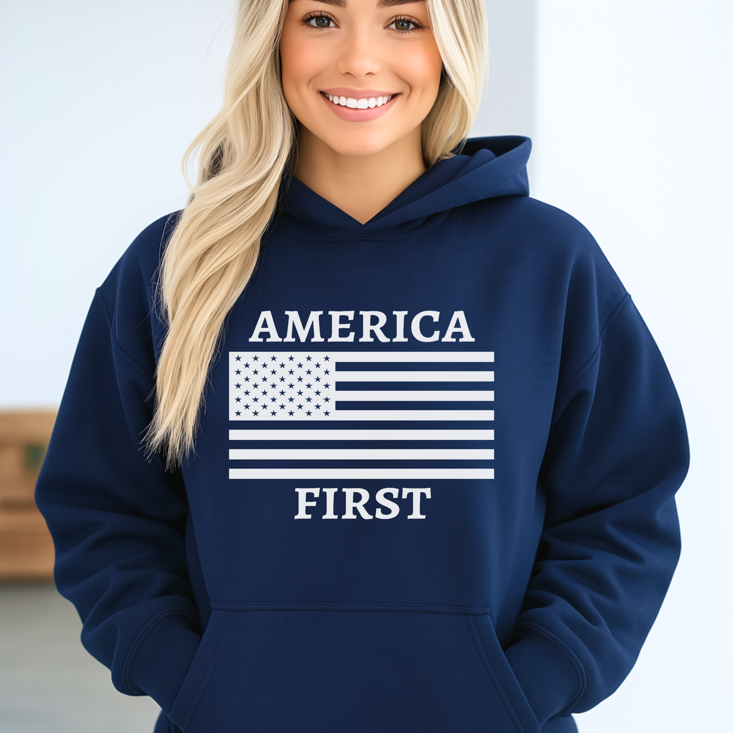Lifestyle photo of woman wearing Navy Blue America First patriotic women’s unisex hoodie