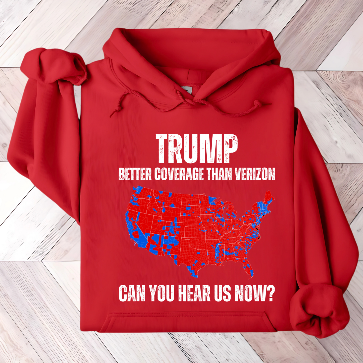 Red patriotic hoodie with red and blue USA map graphic and bold text design.