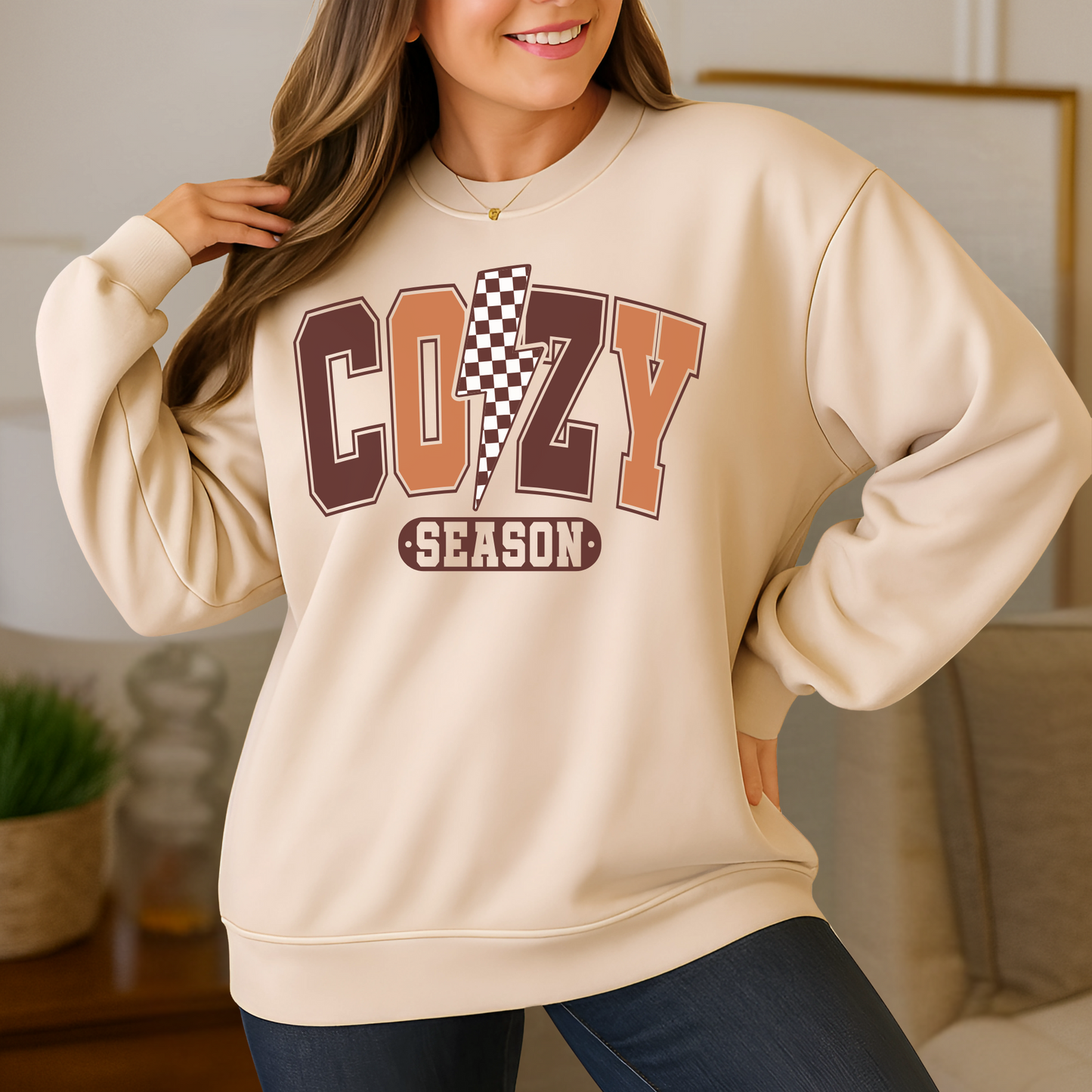 Sand colored Cozy Season sweatshirt styled for autumn indoors