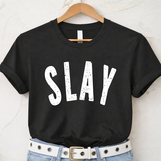 Black t-shirt with 'SLAY' text on a hanger against a white background