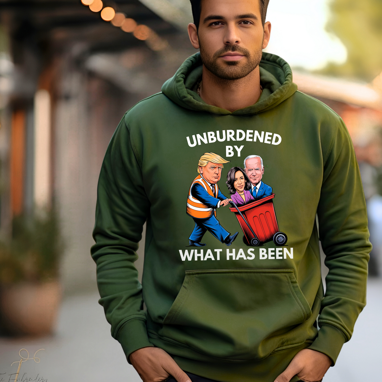 Military green hoodie modeled by man outdoors