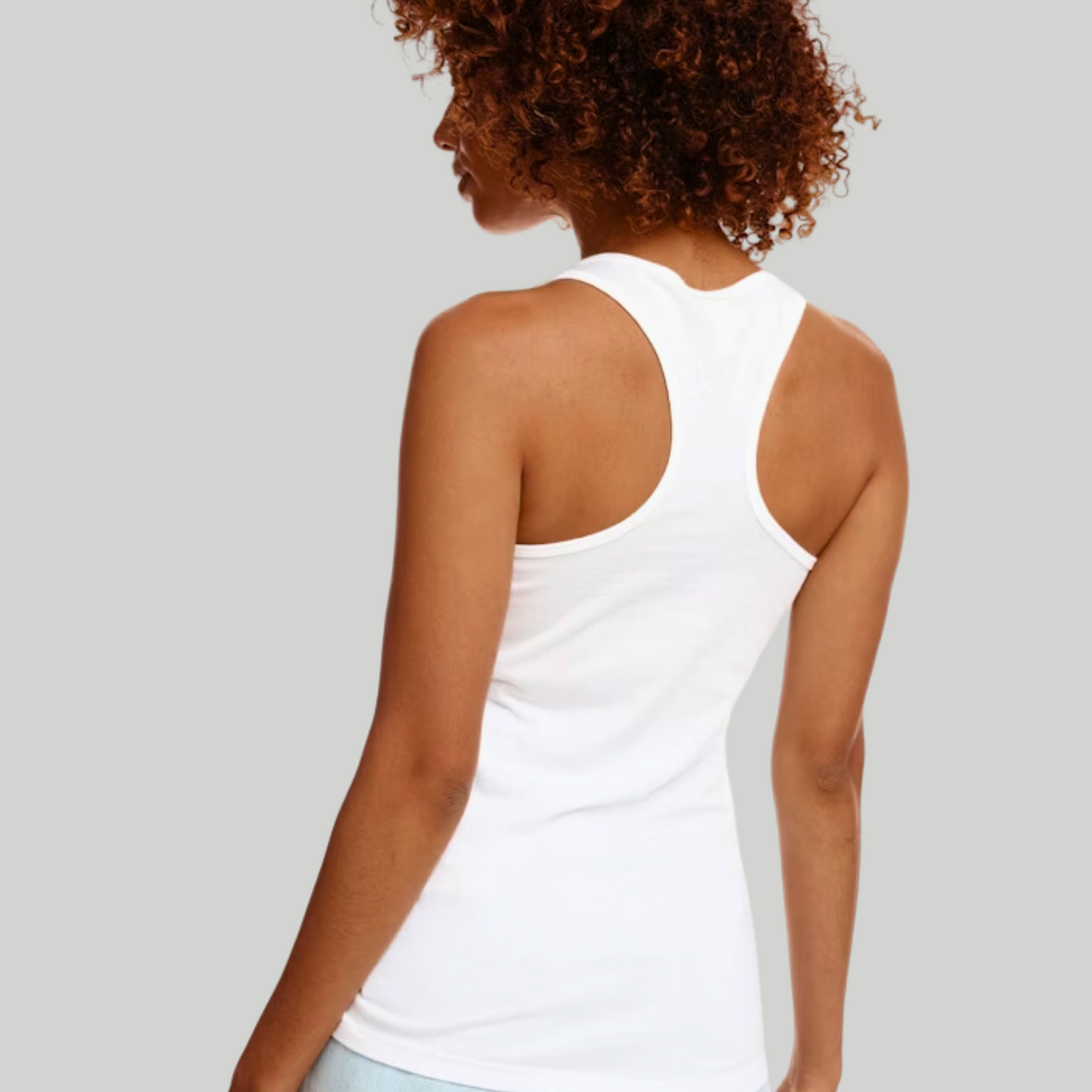 Back view of Red tank → Woman wearing white racerback tank top with bold patriotic graphic – The Right Side Prints