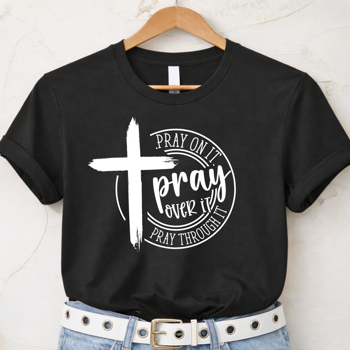 Black Pray Over It Christian t-shirt on hanger with cross faith design