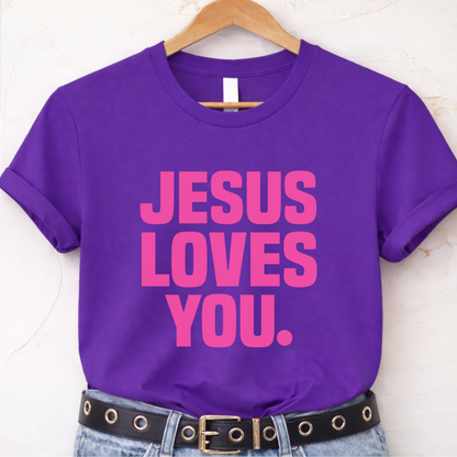 Purple t-shirt with 'Jesus Loves You' text on a hanger