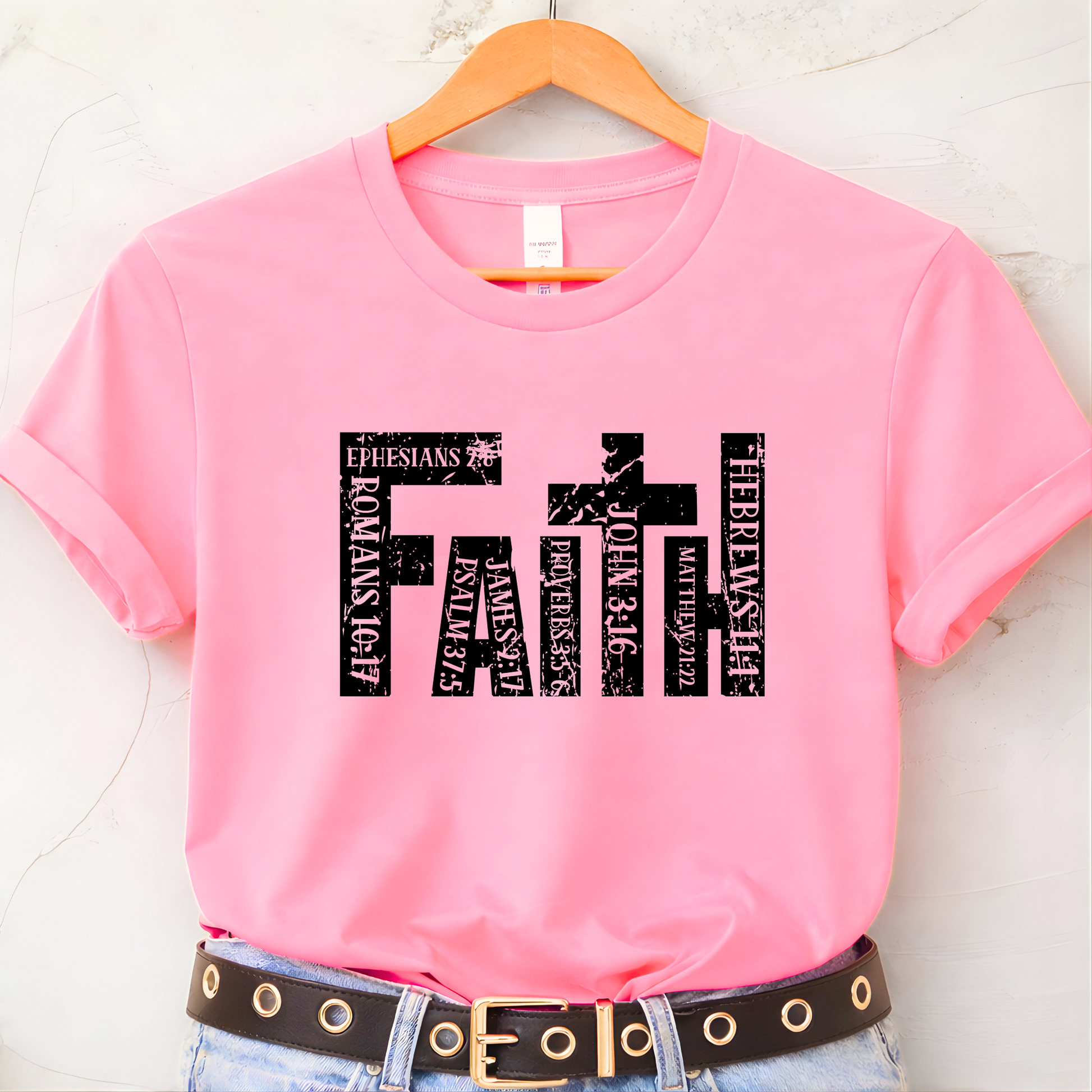 Pink unisex Christian t-shirt lifestyle image with faith cross design