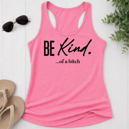 Pink tank top with 'BE Kind...of a bitch' text on a white surface with sunglasses and sandals.