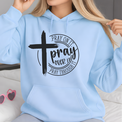 Light blue Pray Over It Christian hoodie with black cross design, front view