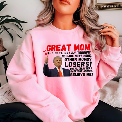 Show your mom she’s the best with this hilarious Great Mom Trump Sweatshirt! Featuring bold text and an iconic thumbs-up image, this design plays on a famous speech style, making it a funny, patriotic, and conservative-friendly gift for Mother’s Day, birthdays, or just because.