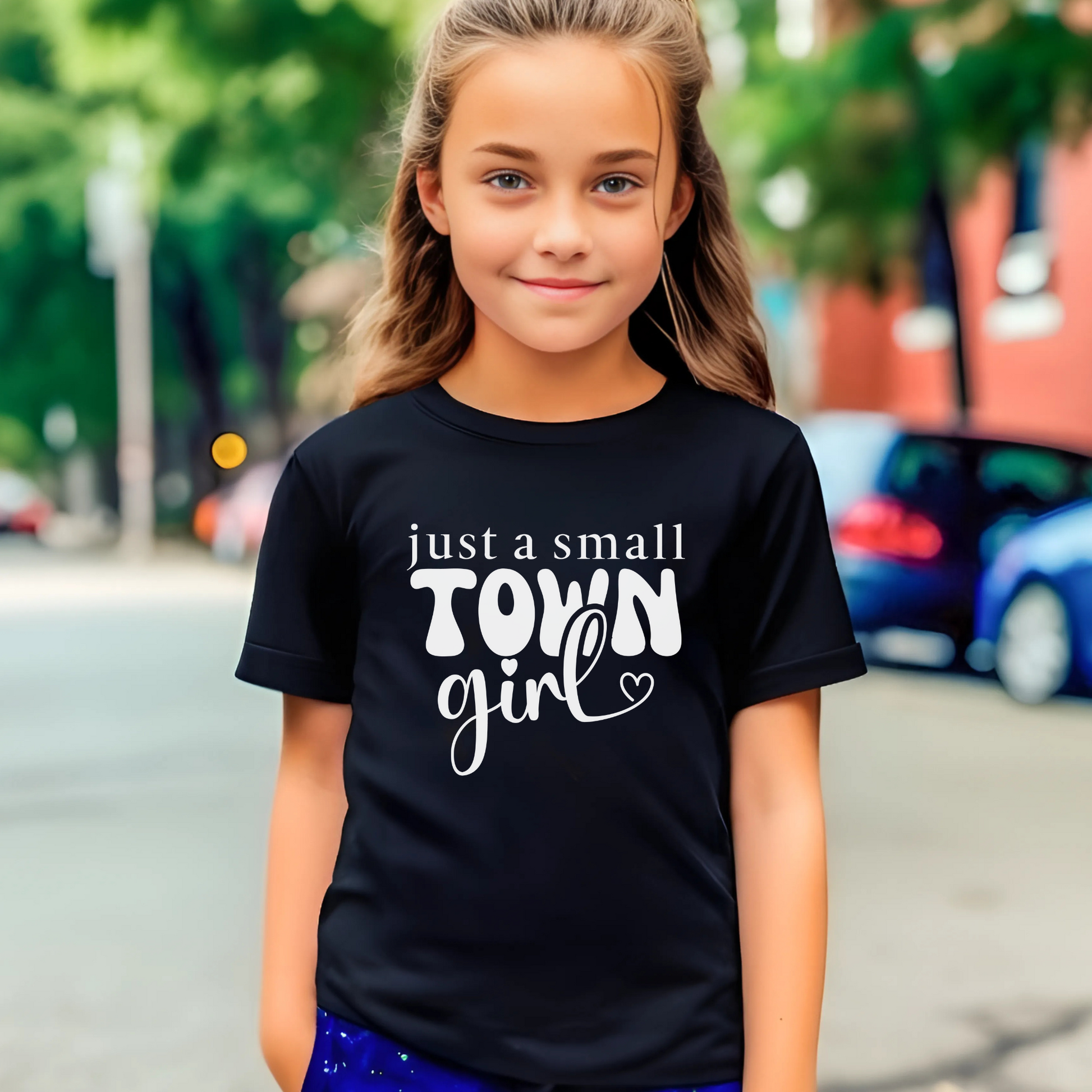 Adorable, black Just a Small Town Girl youth T-shirt styled for a country-loving child
