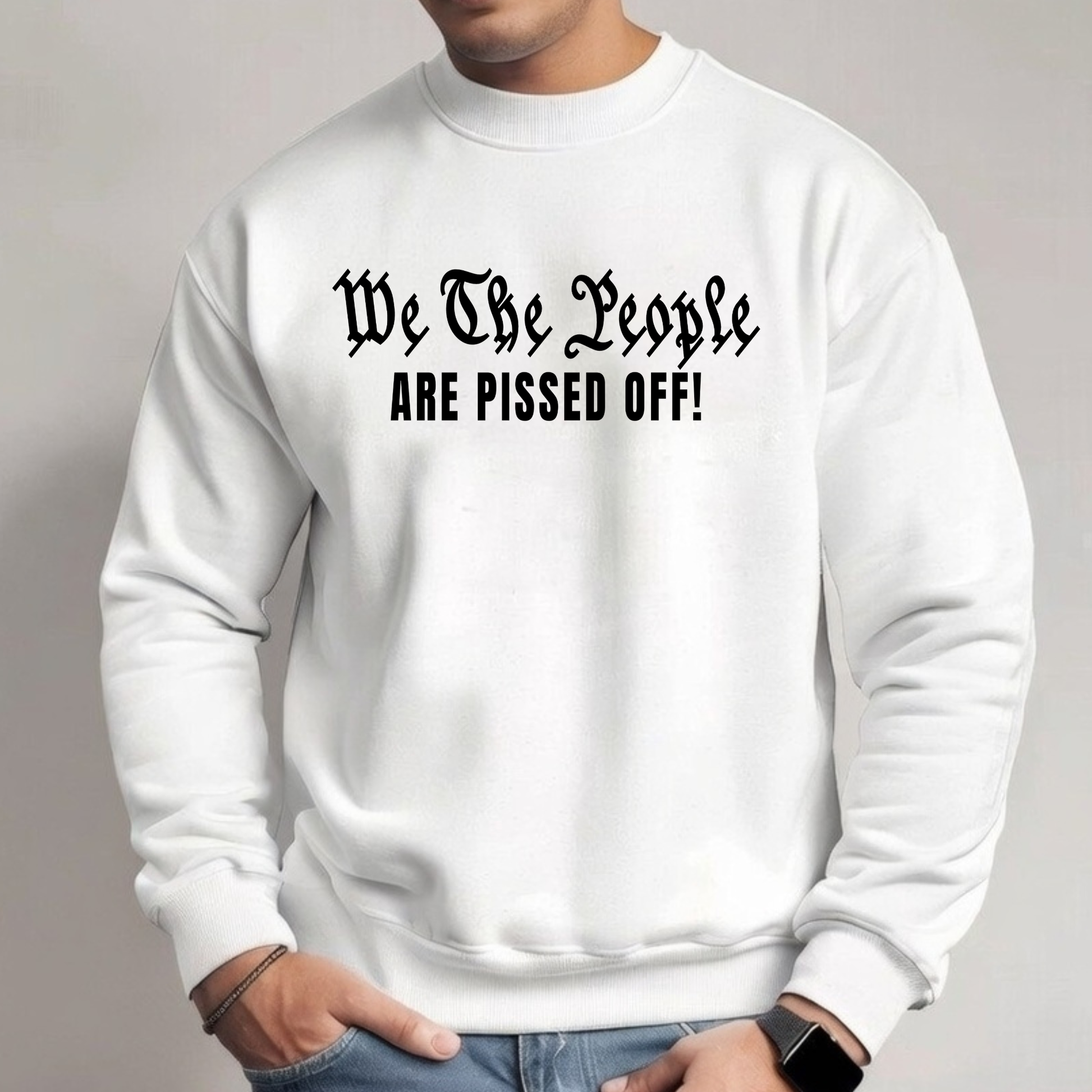 White sweatshirt with text 'We The People ARE PISSED OFF!' on a gray background
