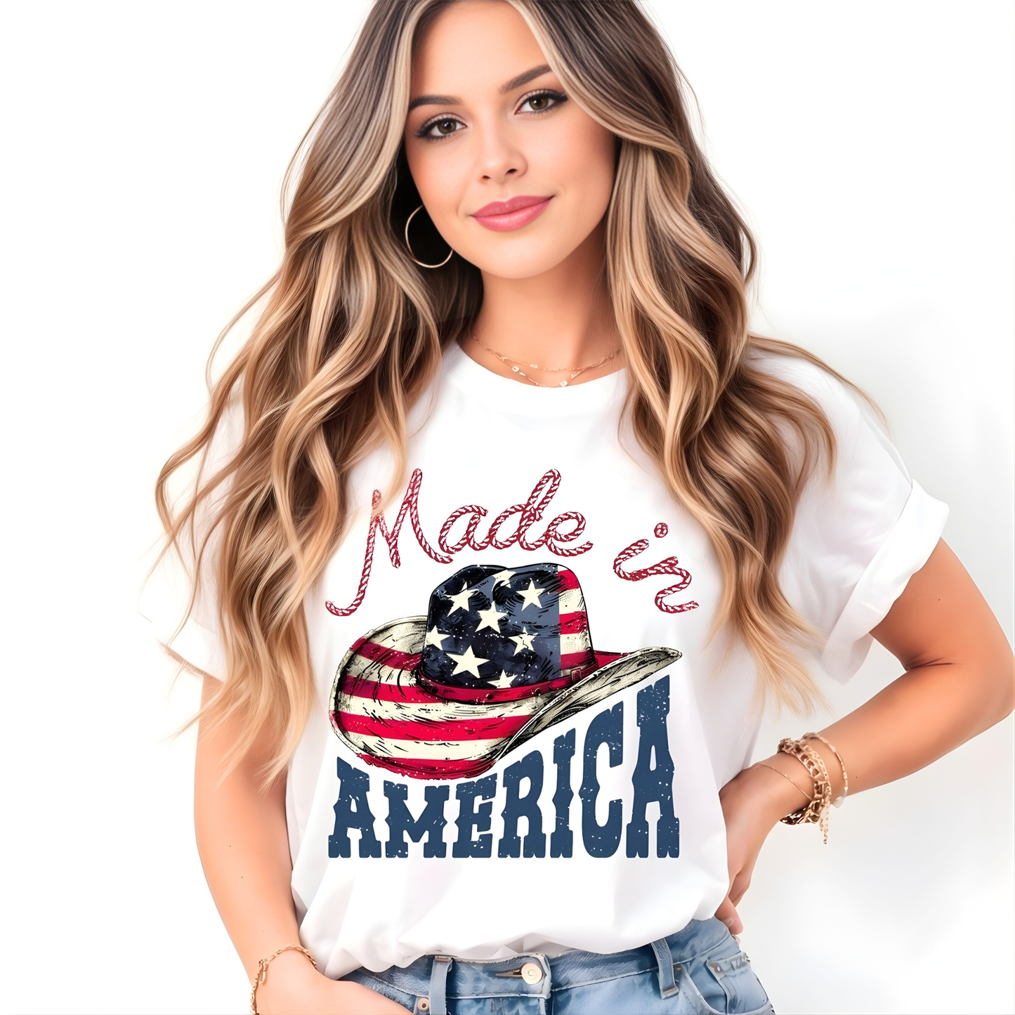 Woman wearing a white t-shirt with 'Made in America' graphic design on a plain background