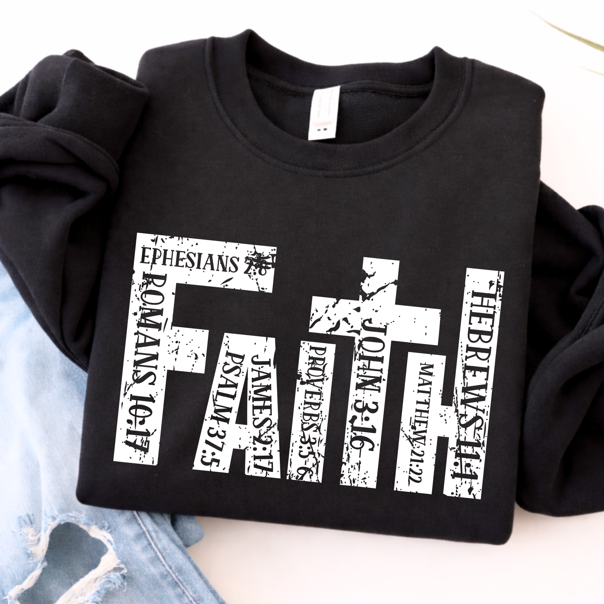 Black unisex Christian sweatshirt featuring distressed faith scripture cross