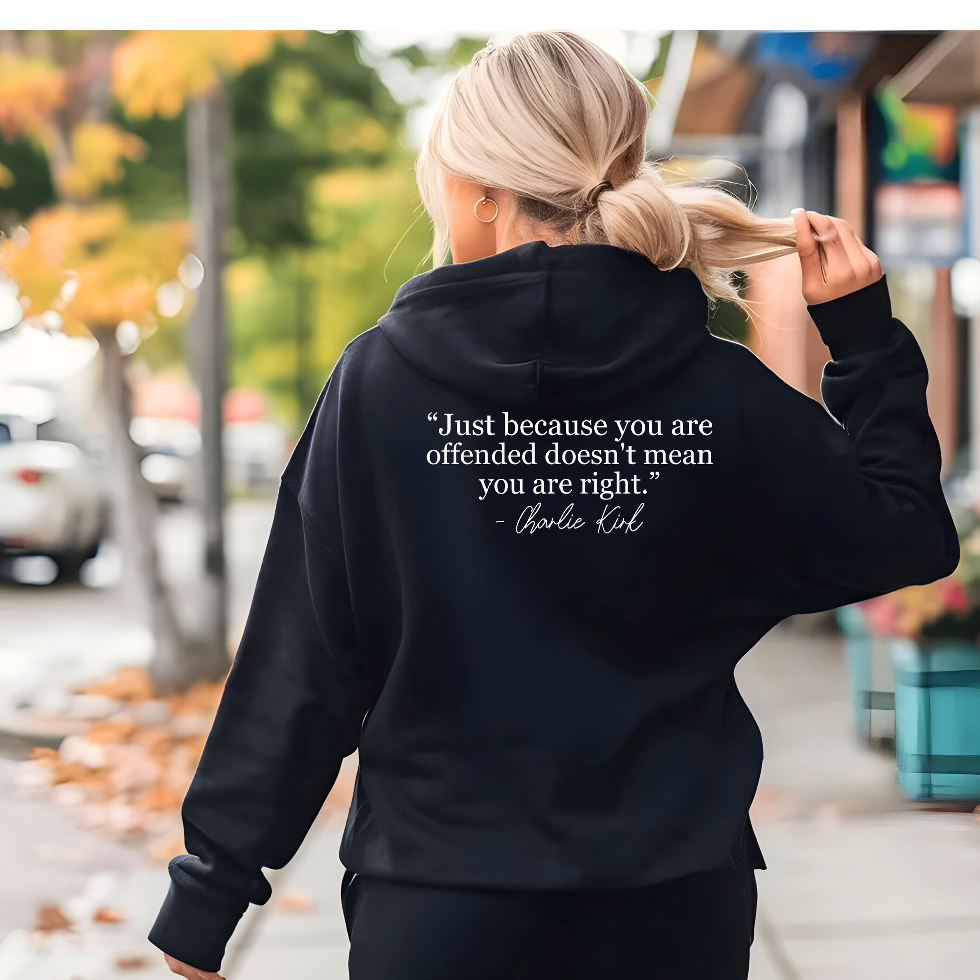 Black FREEDOM women’s hoodie back view with quote