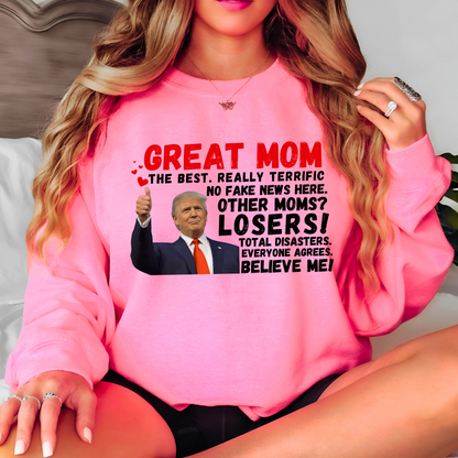 Show your mom she’s the best with this hilarious Great Mom Trump Sweatshirt! Featuring bold text and an iconic thumbs-up image, this design plays on a famous speech style, making it a funny, patriotic, and conservative-friendly gift for Mother’s Day, birthdays, or just because.