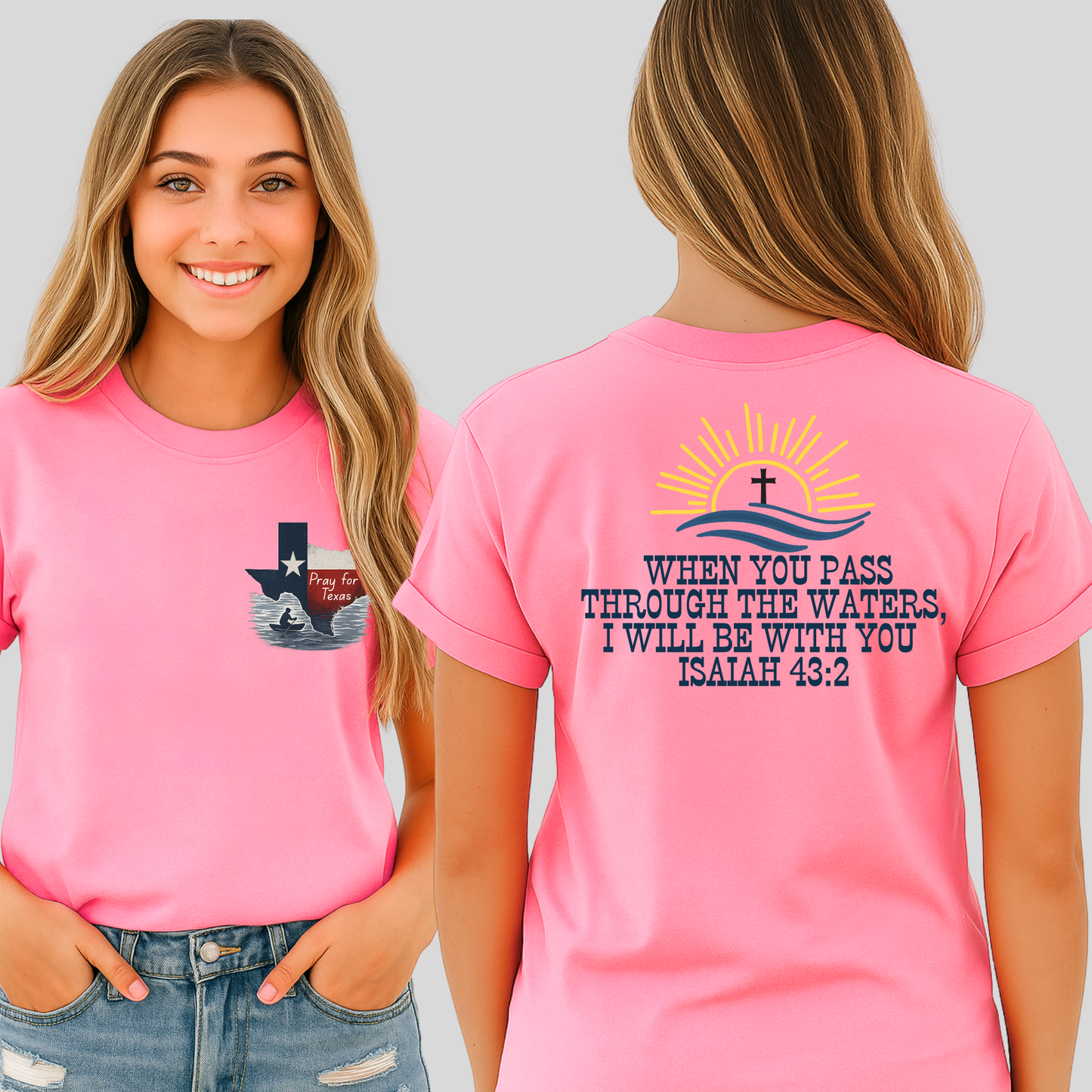 Woman wearing a pink t-shirt with a graphic design and blue jeans against a plain background