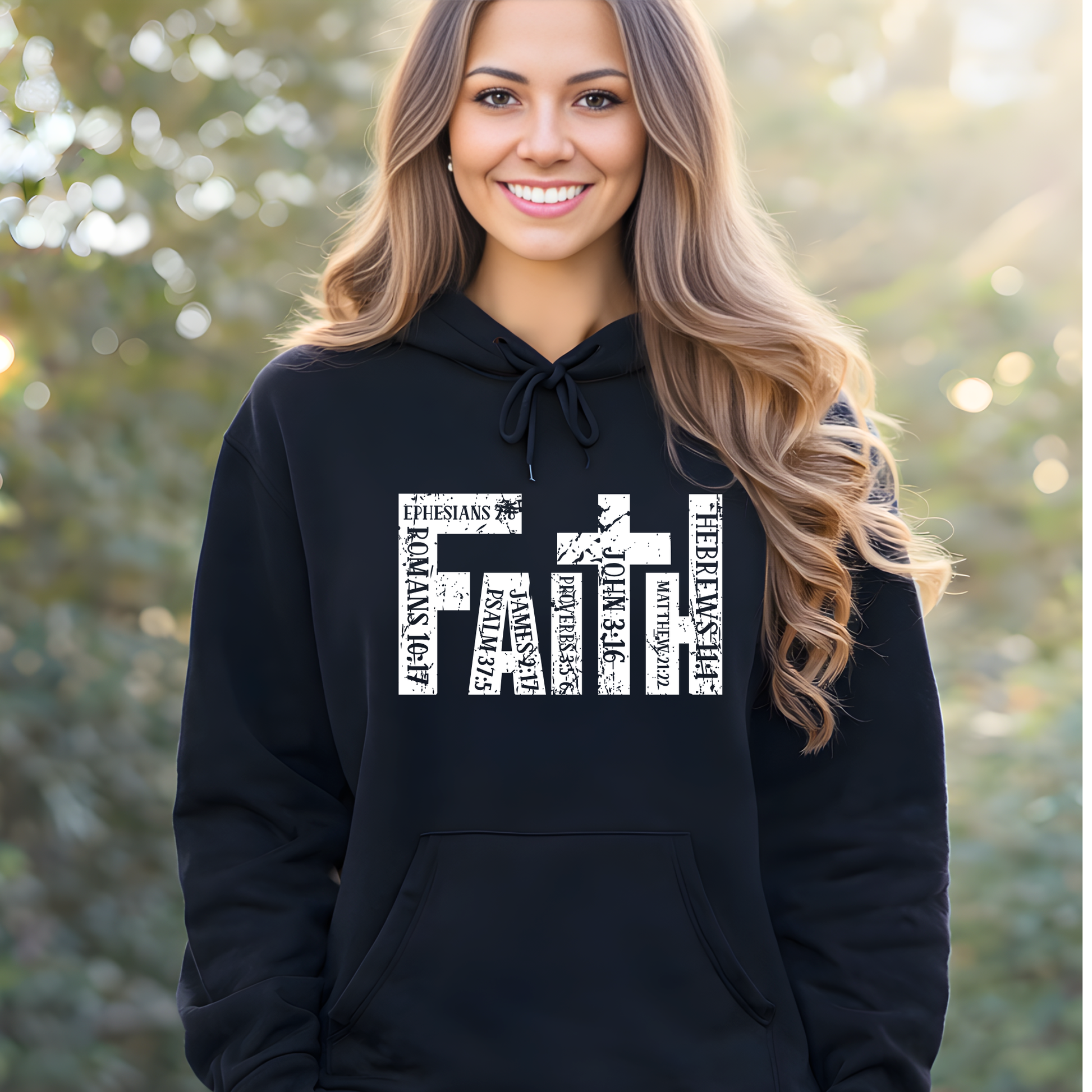 Woman wearing black unisex Christian hoodie featuring faith cross scripture design
