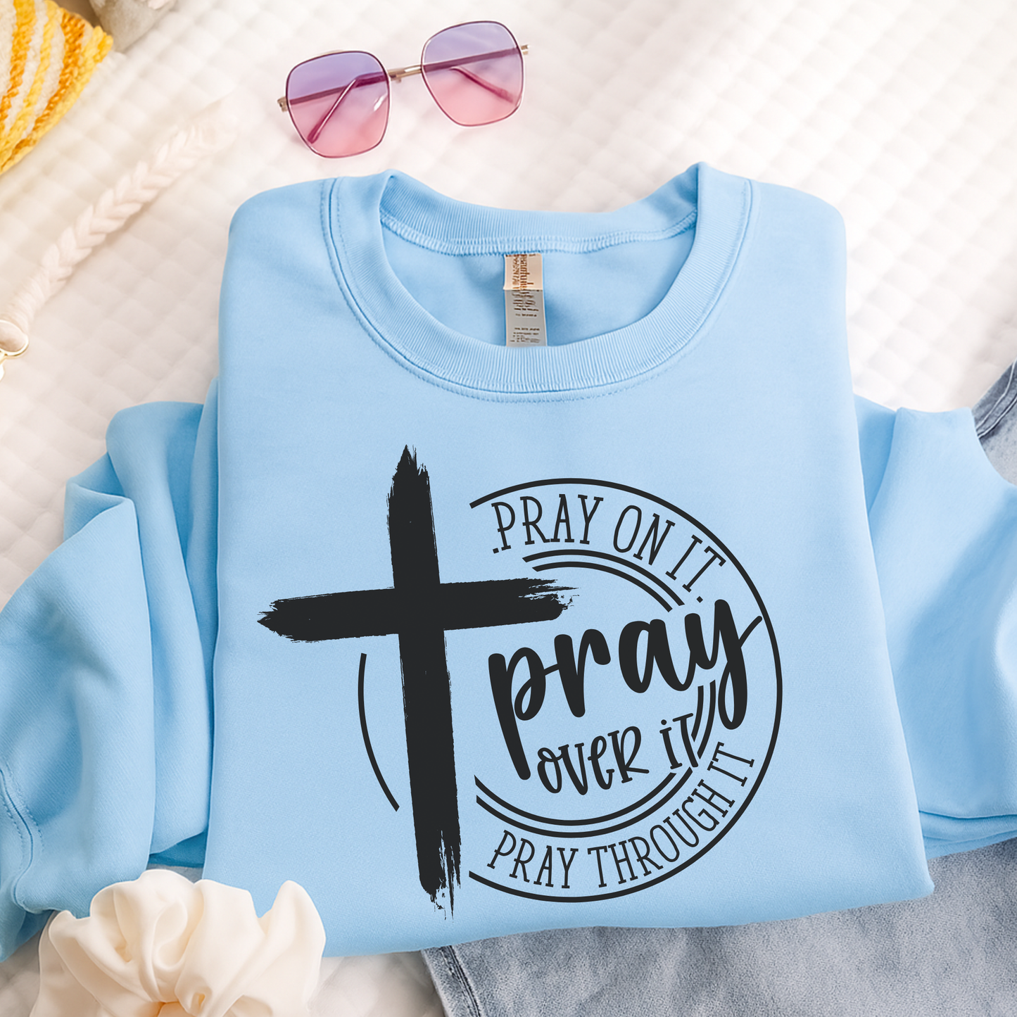 Light blue Pray Over It Christian sweatshirt flat lay with cross design