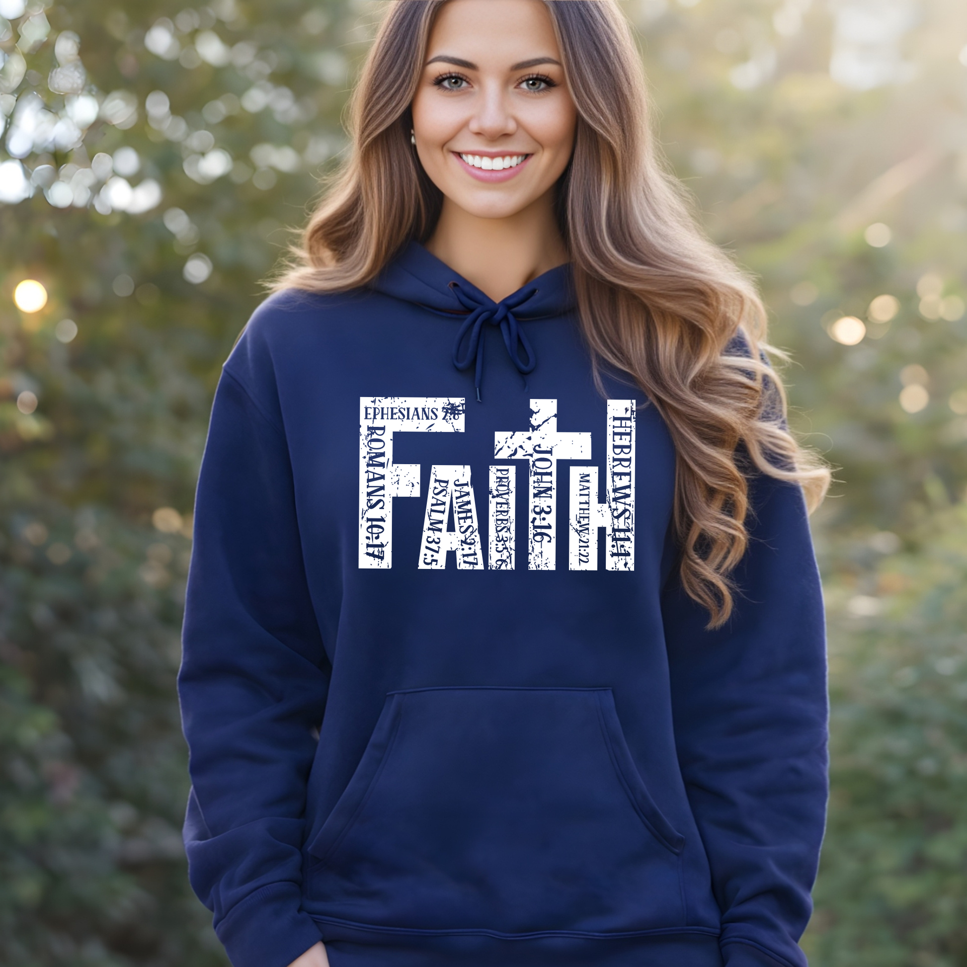 Woman wearing navy blue unisex Christian hoodie with distressed faith cross graphic