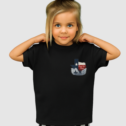 Child wearing a black t-shirt with a graphic design on a plain background