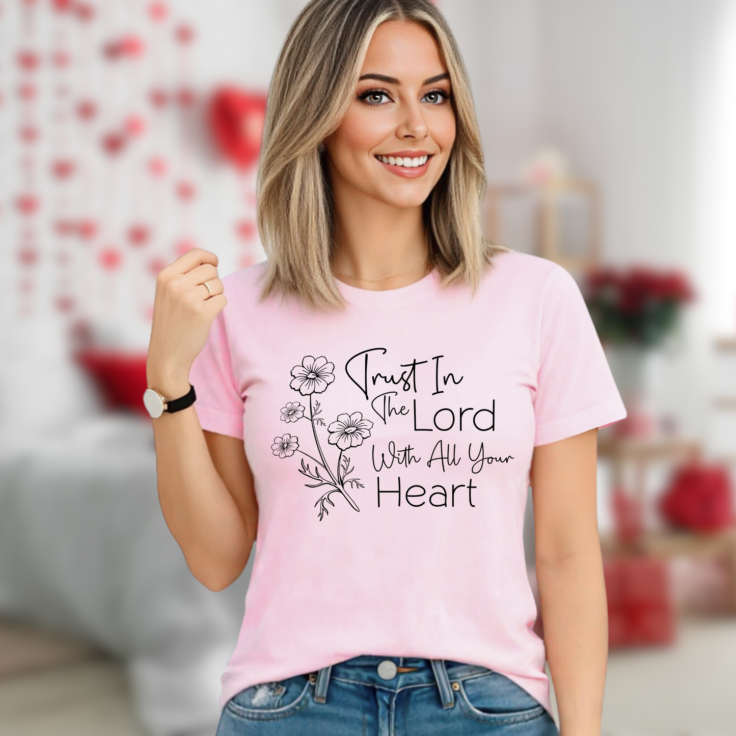 Woman wearing light pink unisex Christian t-shirt with trust in the Lord floral design