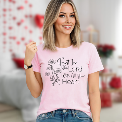 Woman wearing light pink unisex Christian t-shirt with trust in the Lord floral design