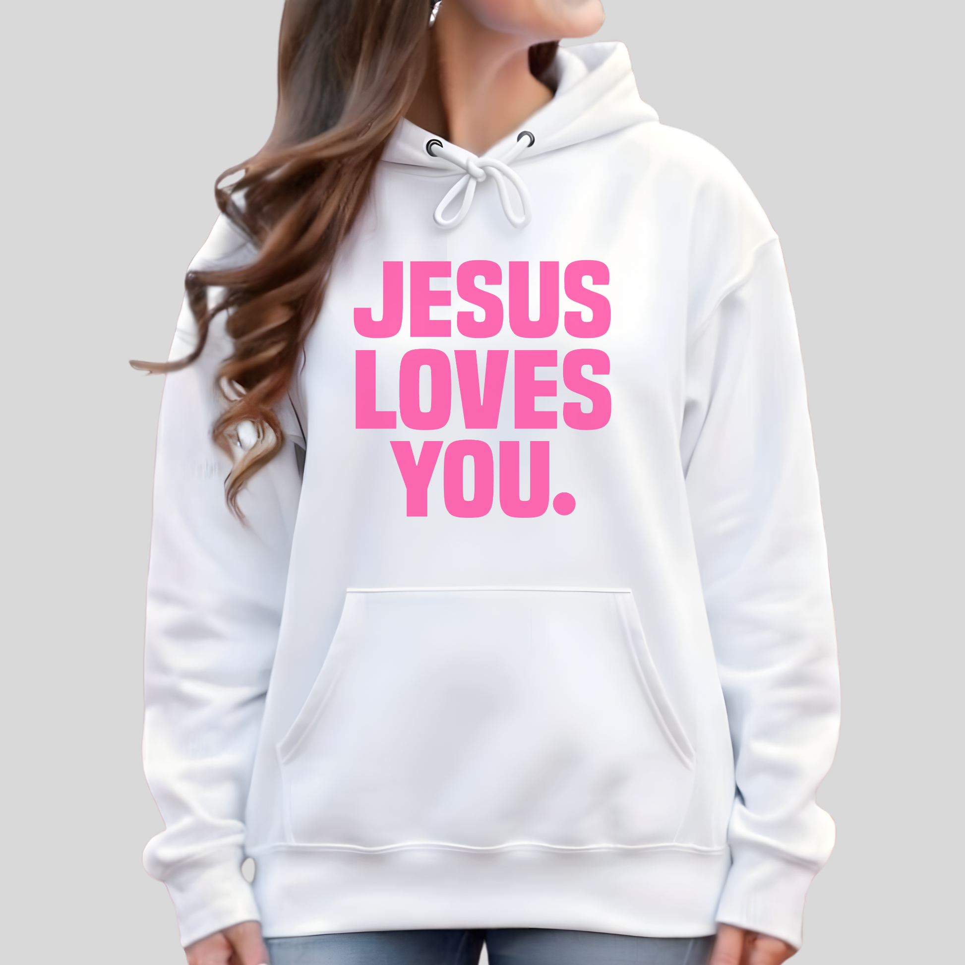 White hoodie with 'Jesus Loves You' text in pink on a plain background