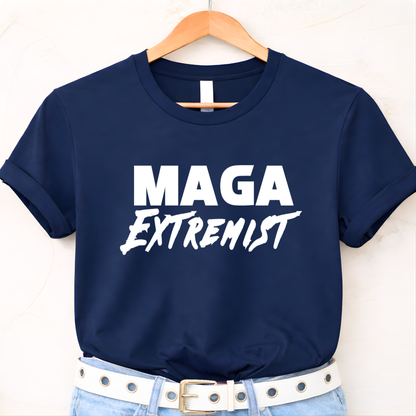 Navy blue MAGA Extremist t-shirt hanging on wooden hanger, bold political graphic tee