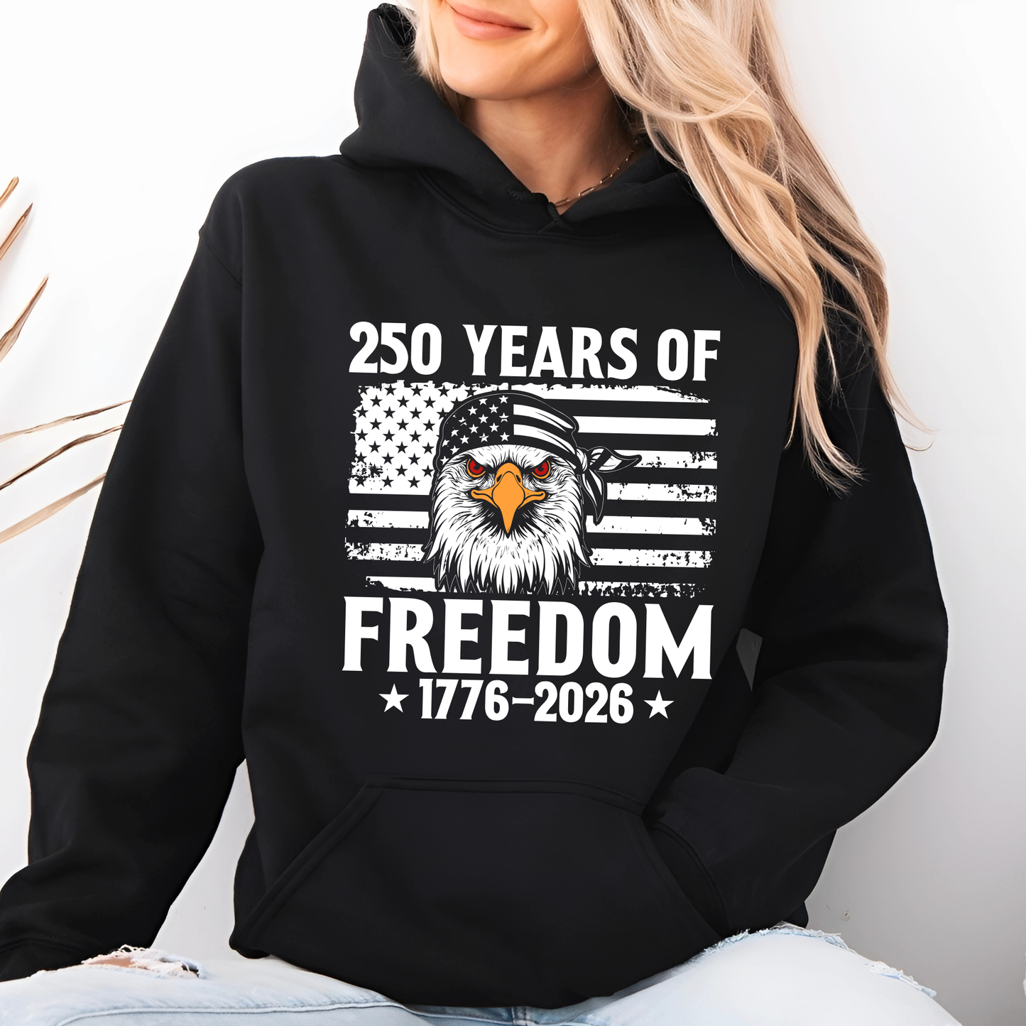 250 Years of Freedom patriotic eagle graphic on black women’s pullover hoodie lifestyle mockup