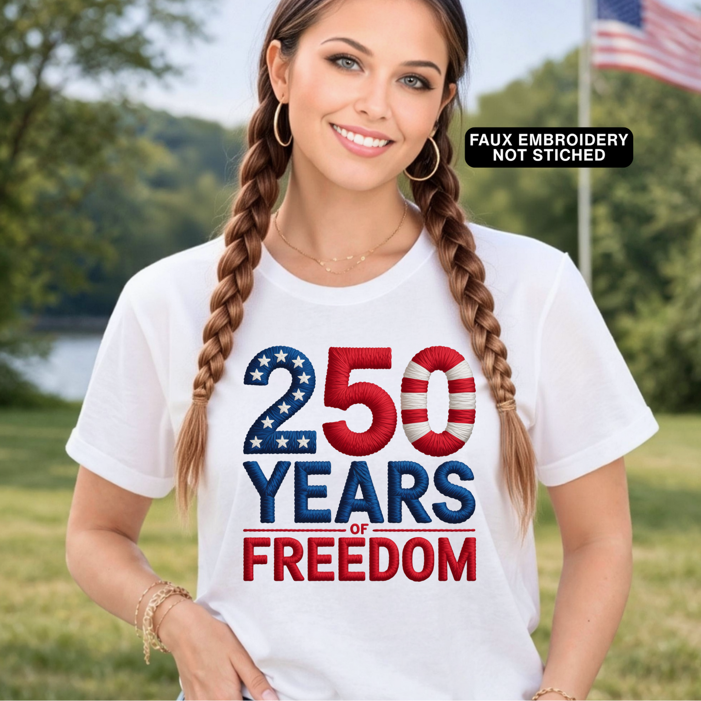 Woman wearing a white t-shirt with '250 Years of Freedom' design outdoors.
