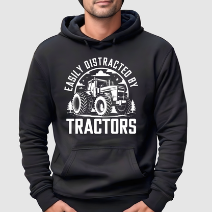 Black hoodie with tractor graphic and text on a gray background