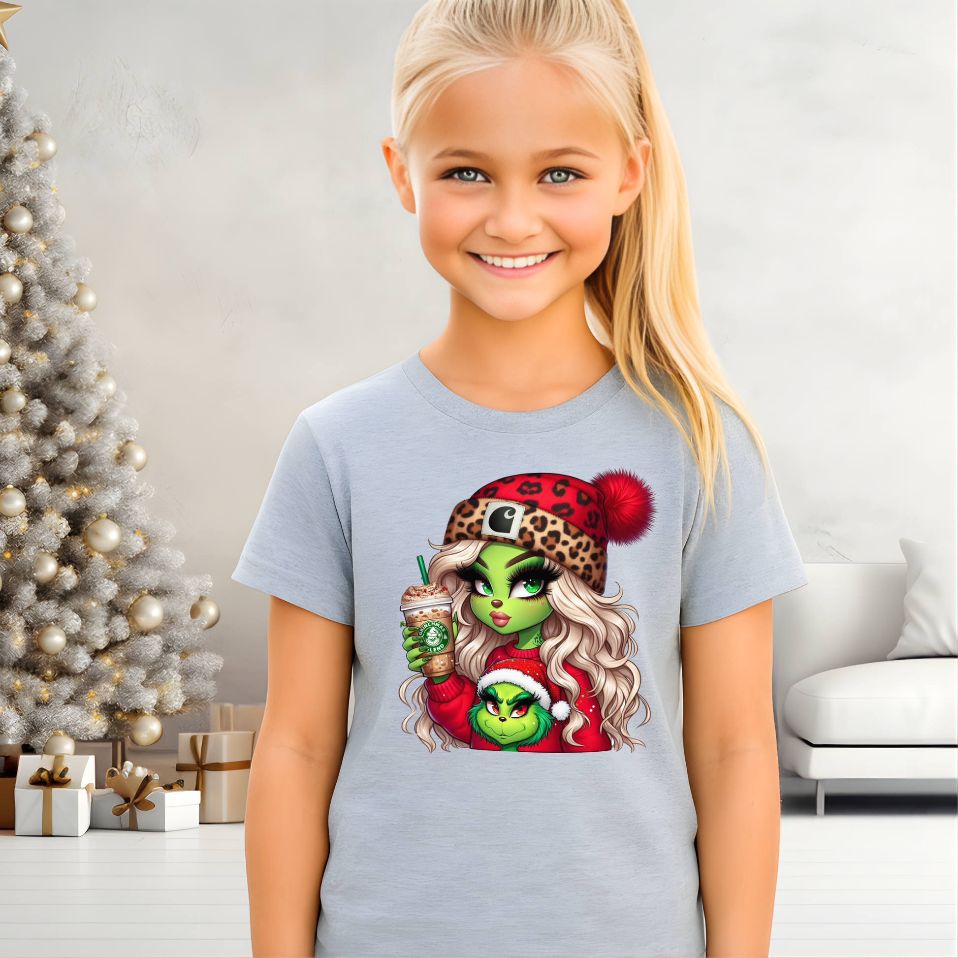 Young girl wearing a t-shirt with a graphic design in a festive room with a Christmas tree.