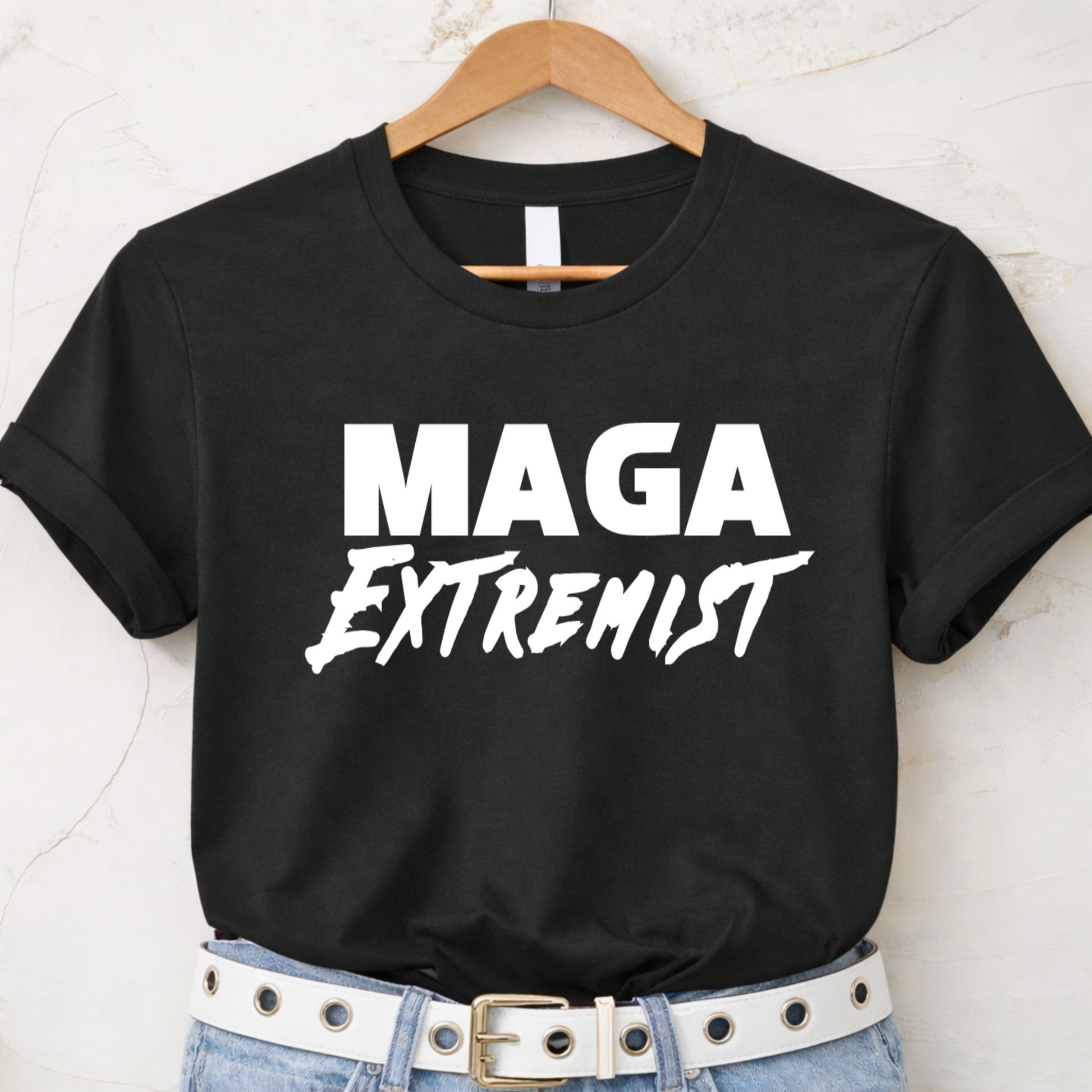 Black MAGA Extremist t-shirt flat lay with white text, conservative women’s apparel