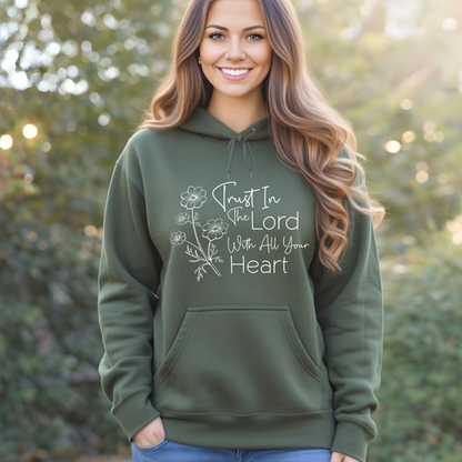 Woman wearing military green unisex Christian hoodie with floral faith design