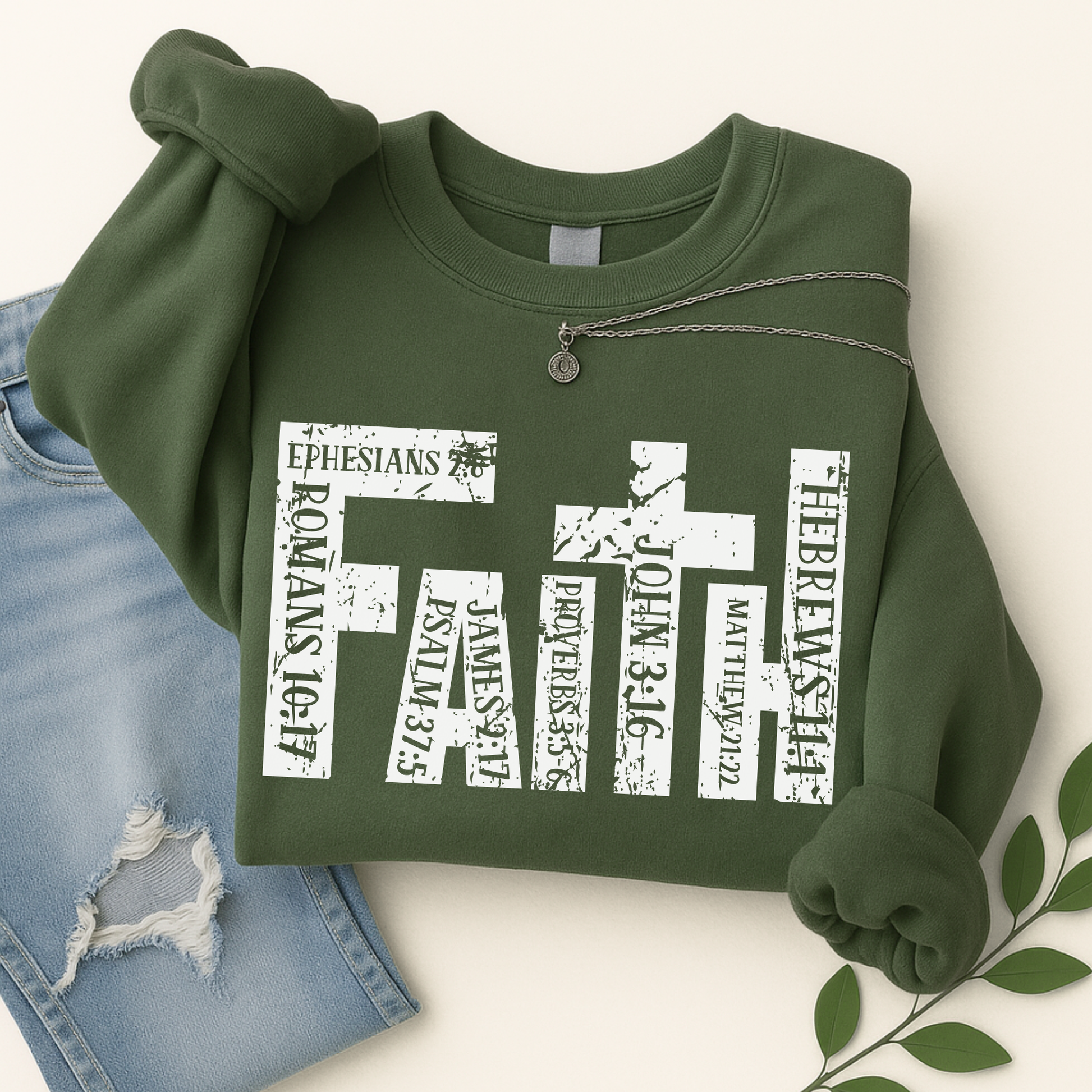 Green sweatshirt with religious text design on a white background