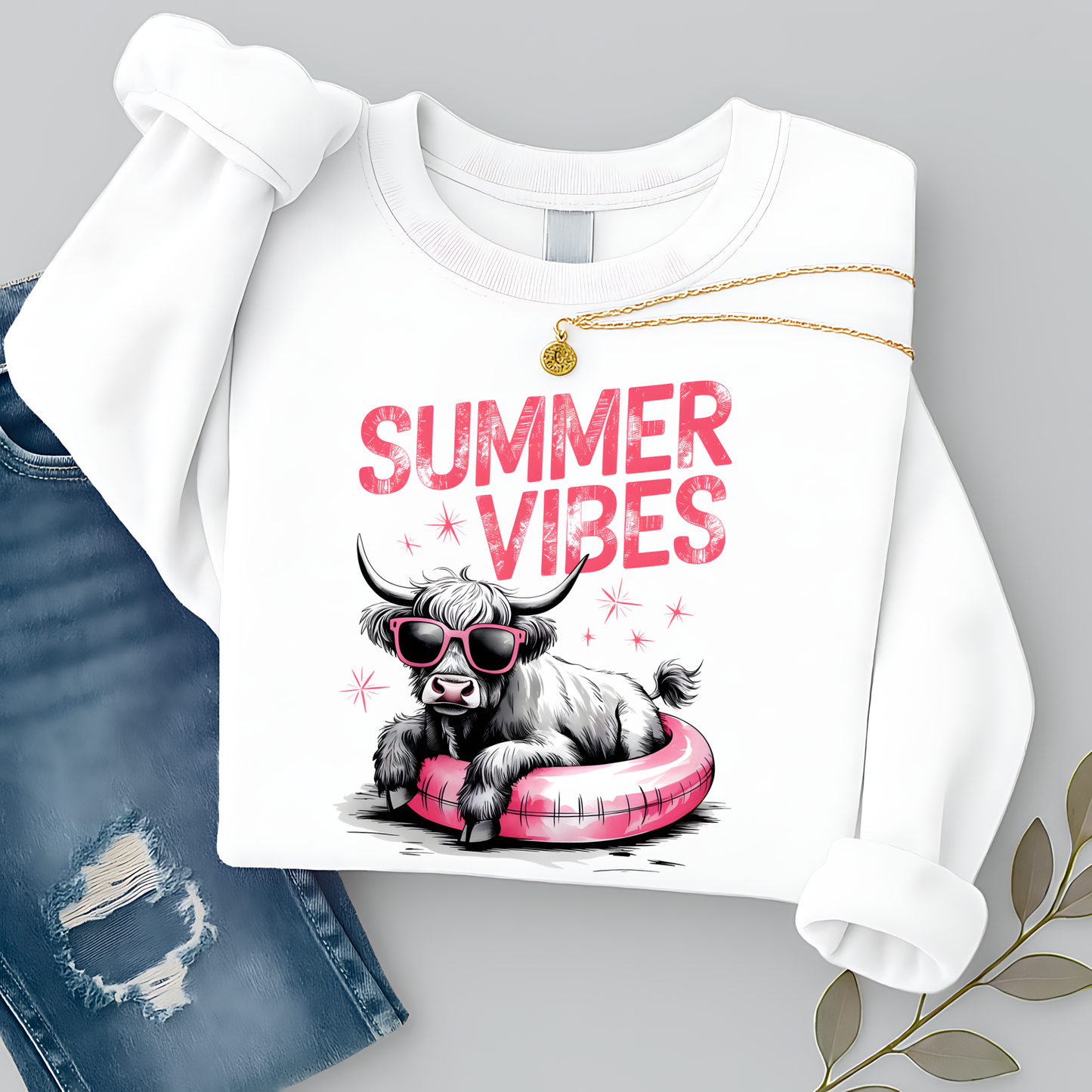 White sweatshirt with 'Summer Vibes' design featuring a highland  cow on a gray background