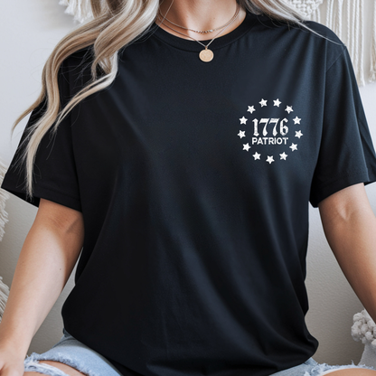 Person wearing a black t-shirt with '1776 PATRIOT' design