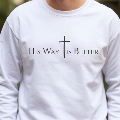 White long-sleeve shirt with 'His Way Is Better' text and cross design.