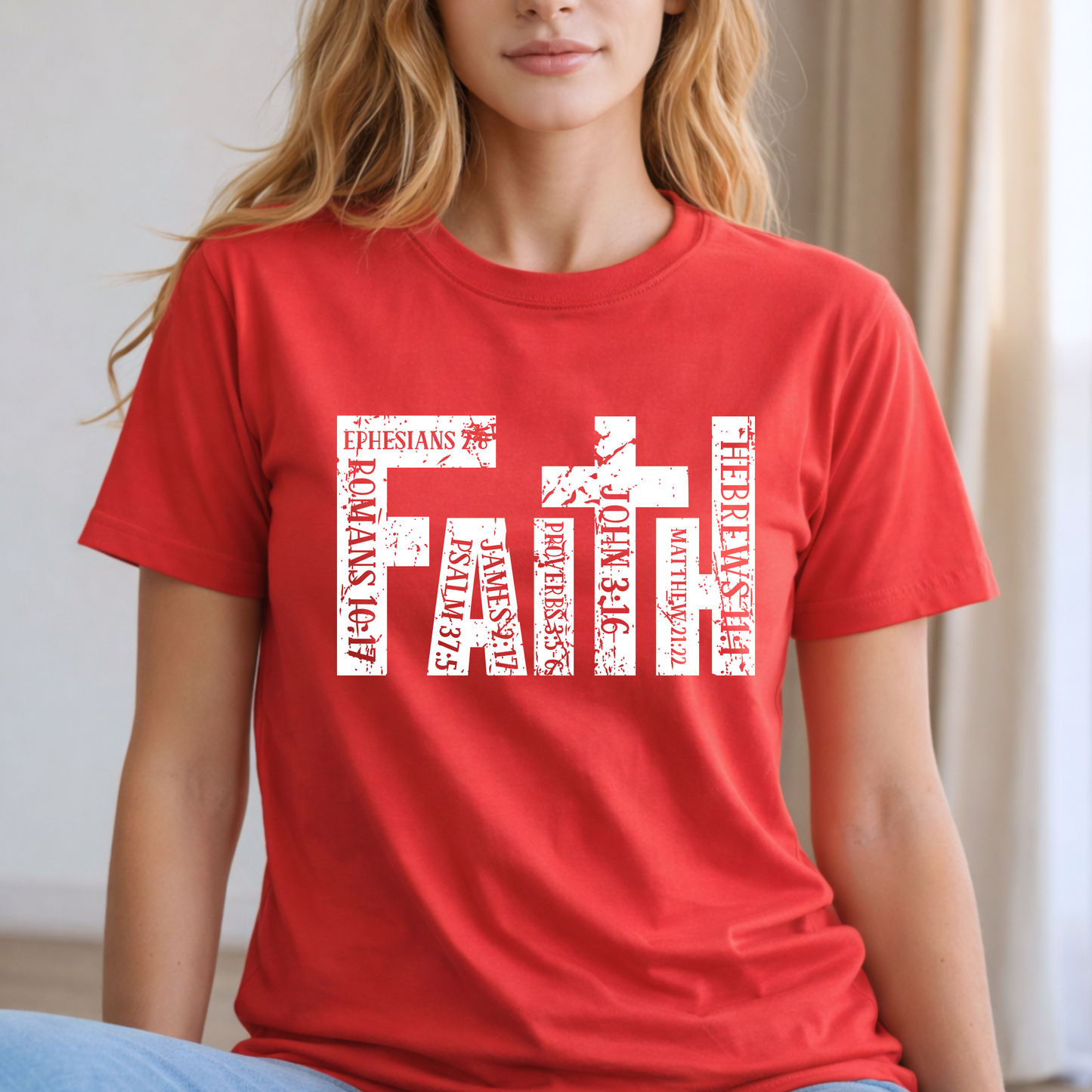 Person wearing a red t-shirt with white  Christian text design