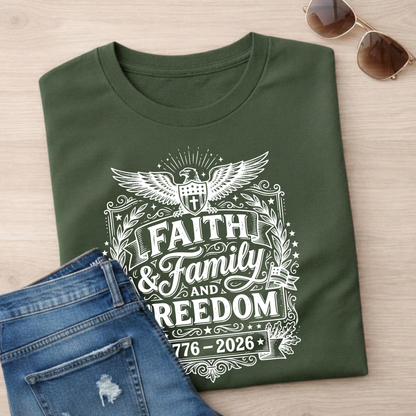 Green t-shirt with 'Faith & Family & Freedom' design on a wooden surface with jeans and sunglasses.