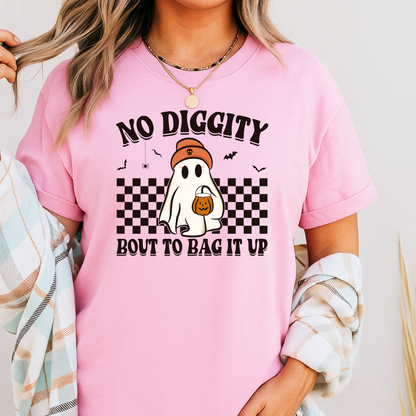 Person wearing a pink t-shirt with a ghost graphic and text.