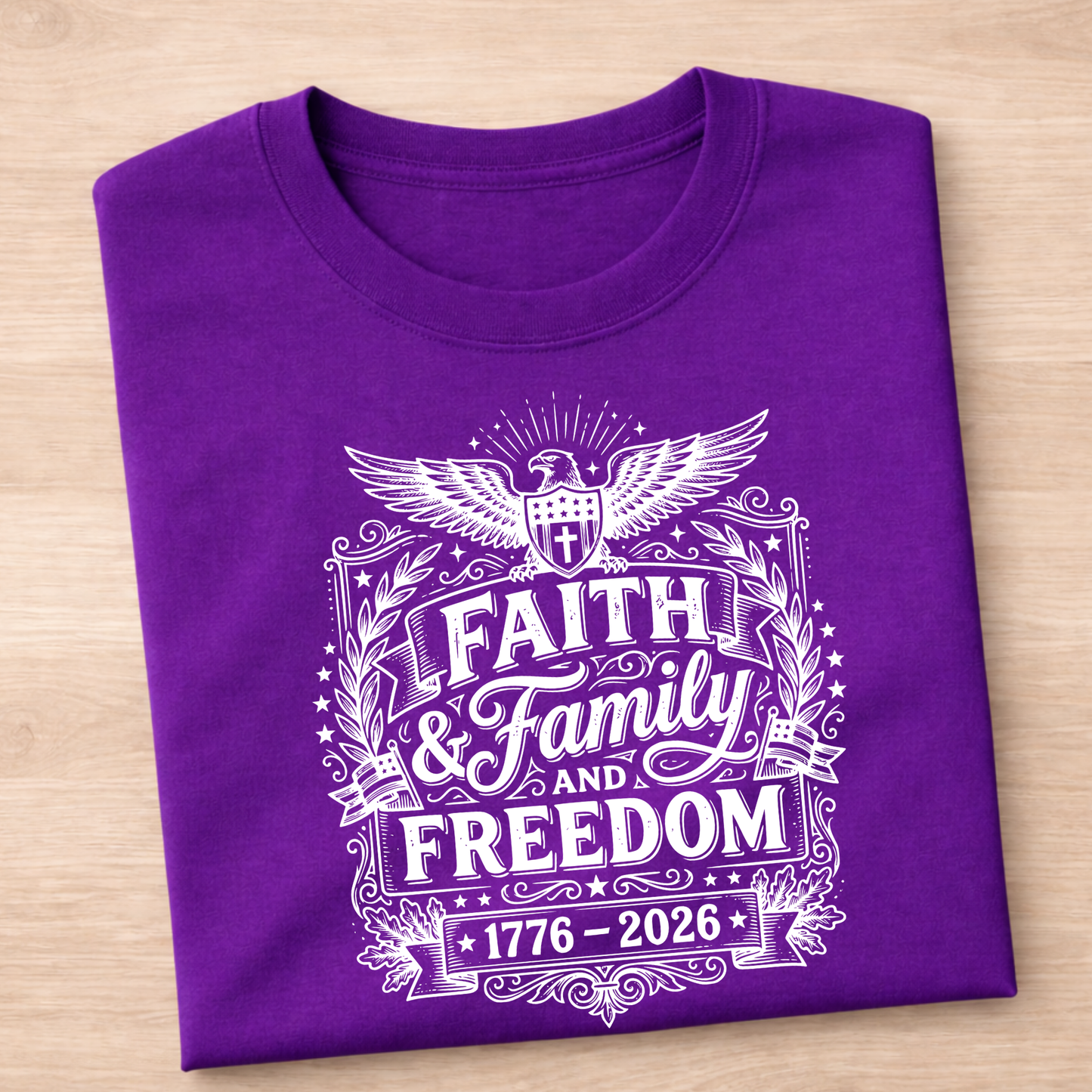 Purple patriotic  t-shirt with white text and design on a wooden surface