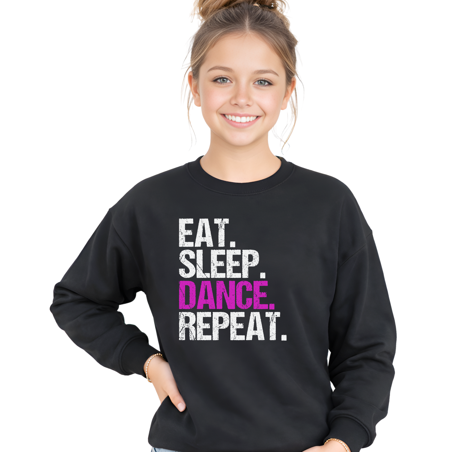 Young girl wearing a black sweatshirt with 'EAT. SLEEP. DANCE. REPEAT.' text on a white background